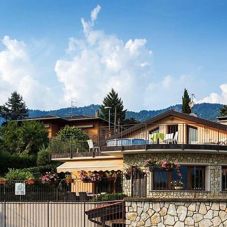 Апартаменты Il Sasso Bianco Bb Комерио Экстерьер фото